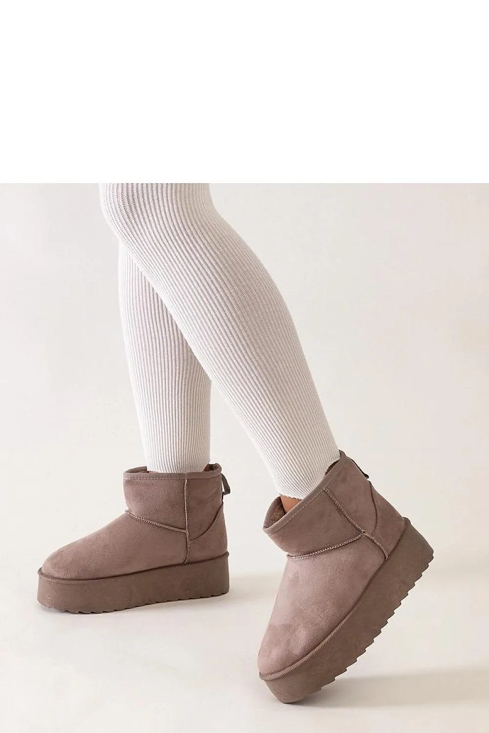 Casual snow boots on a high platform