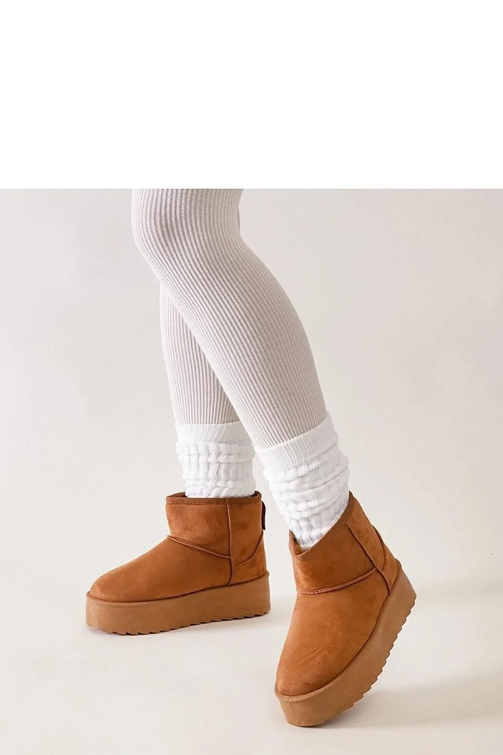 Casual snow boots on a high platform