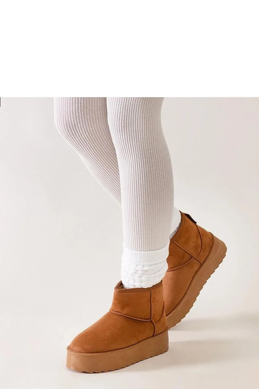 Casual snow boots on a high platform